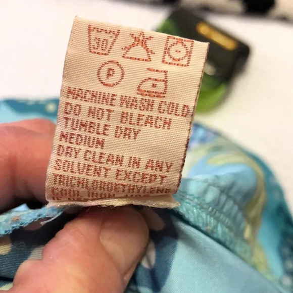 Aventura summer shirt.  Snap close and open pockets on front and back.  Size 6 - Picture 10 of 10